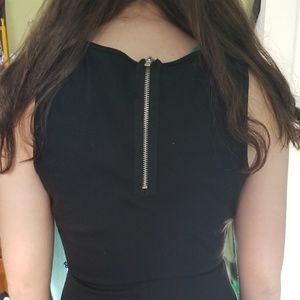 Black mini dress with zipper back. Really cute. H